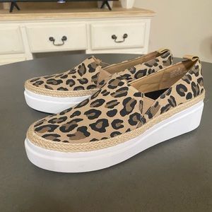 Yellow box tennis shoes